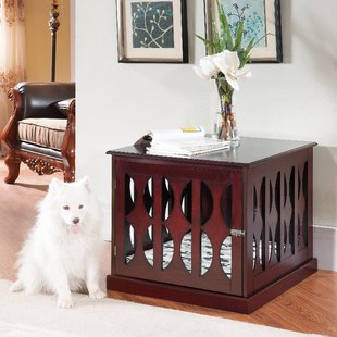 Furniture dog crate with white dog